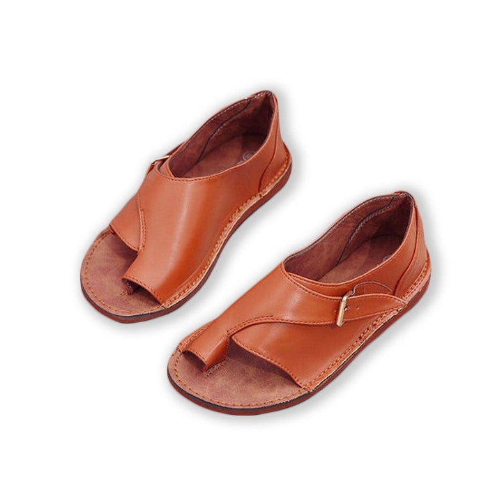 "Kvinnors eleganta sandaler med spänneband, låg platåklack och korsbälte för maximal komfort och sommarstil."