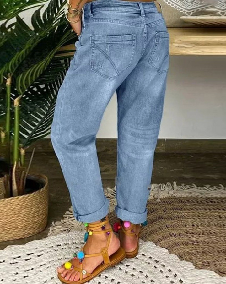 "Kvinnors hög midja jeans i klassisk stil, slitstark denim, smickrande silhuett. Perfekt för vardag och formella tillfällen."
