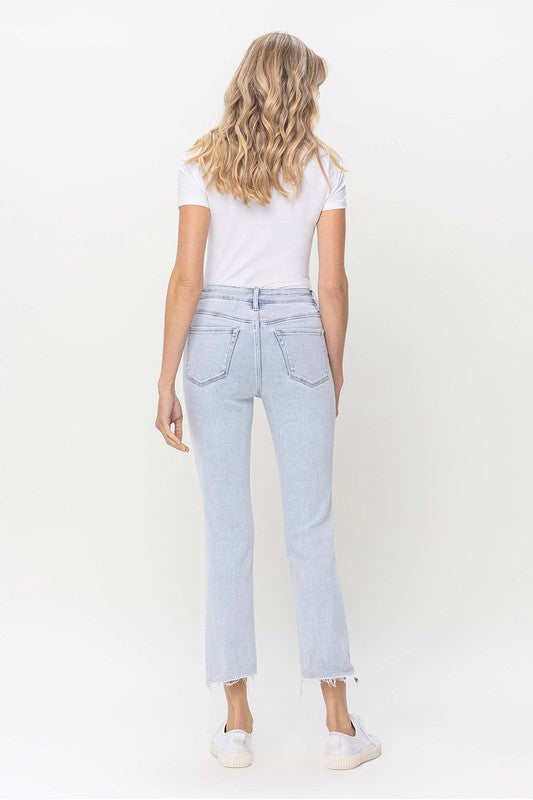 "Kvinnors höga midja raka jeans i ljus denim, elegant design med rak benform för stil och komfort."