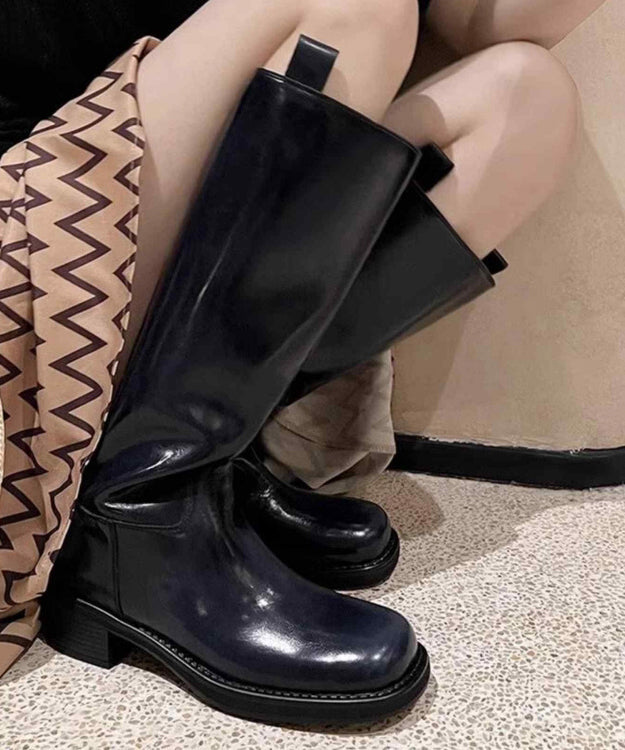 "Kvinnors höga stövlar med chunky heel i brunt syntetiskt läder, stilren design, perfekt för både formella och informella til