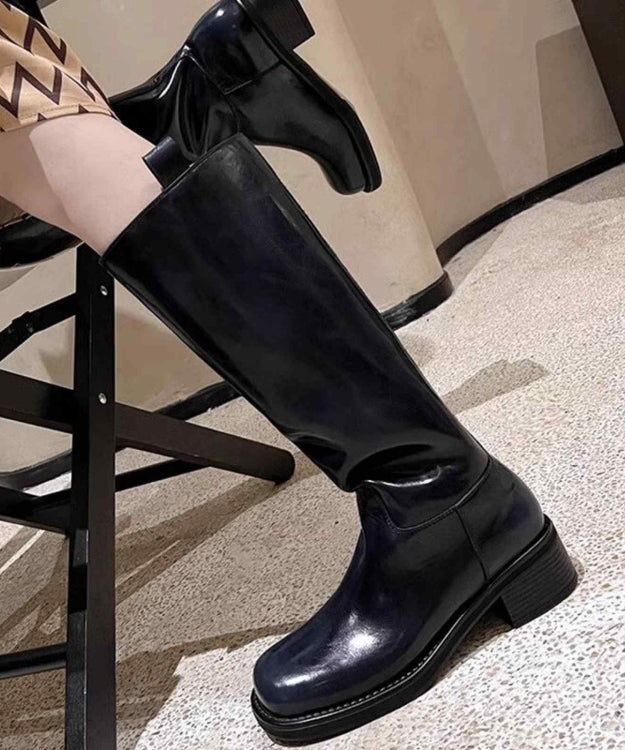 "Kvinnors höga stövlar med chunky heel i brunt syntetiskt läder, stilren design, perfekt för både formella och informella til