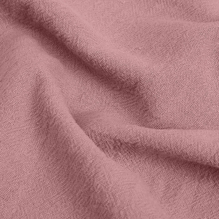 Kvinnors höga tygbyxor med lös passform och stilren design, perfekt för komfort och elegans vid alla tillfällen.
