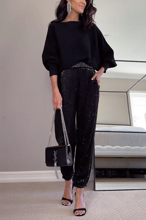 Kvinnors högmidjade glittrande joggers med skimrande paljetter, perfekt för både vardag och fest. Eleganta och bekväma.