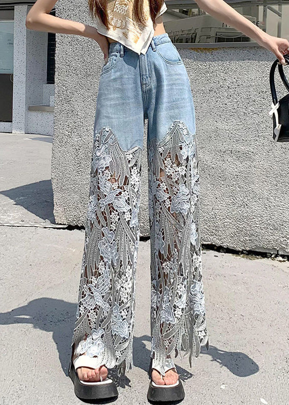 "Kvinnors jeans med håldesign och spetsdetaljer i denim, perfekt för att framhäva en unik stil."