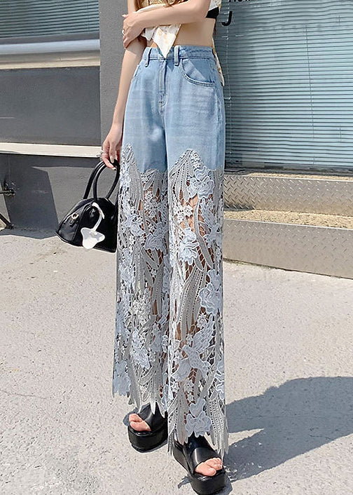 "Kvinnors jeans med håldesign och spetsdetaljer i denim, perfekt för att framhäva en unik stil."