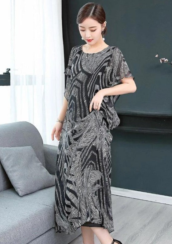 Kvinnors kaftan klänning i chiffong, O-hals, mönstrad, luftig och elegant design, perfekt för sommar och fest.