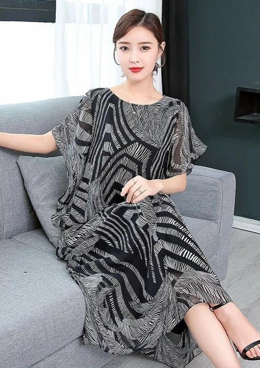 Kvinnors kaftan klänning i chiffong, O-hals, mönstrad, luftig och elegant design, perfekt för sommar och fest.