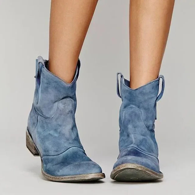 "Kvinnors klassiska cowboystövlar, elegant brun design med autentisk västerländsk stil, perfekt för alla tillfällen."