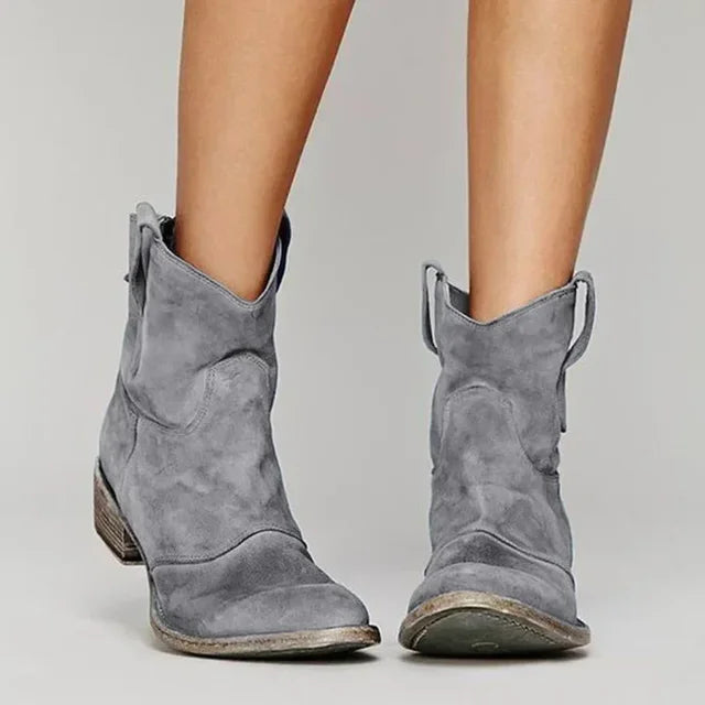 "Kvinnors klassiska cowboystövlar, elegant brun design med autentisk västerländsk stil, perfekt för alla tillfällen."