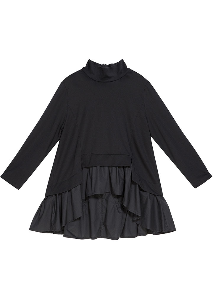 "Kvinnors långärmad topp med asymmetrisk design och volanger, feminin stil i mjukt tyg, perfekt för höstmode."