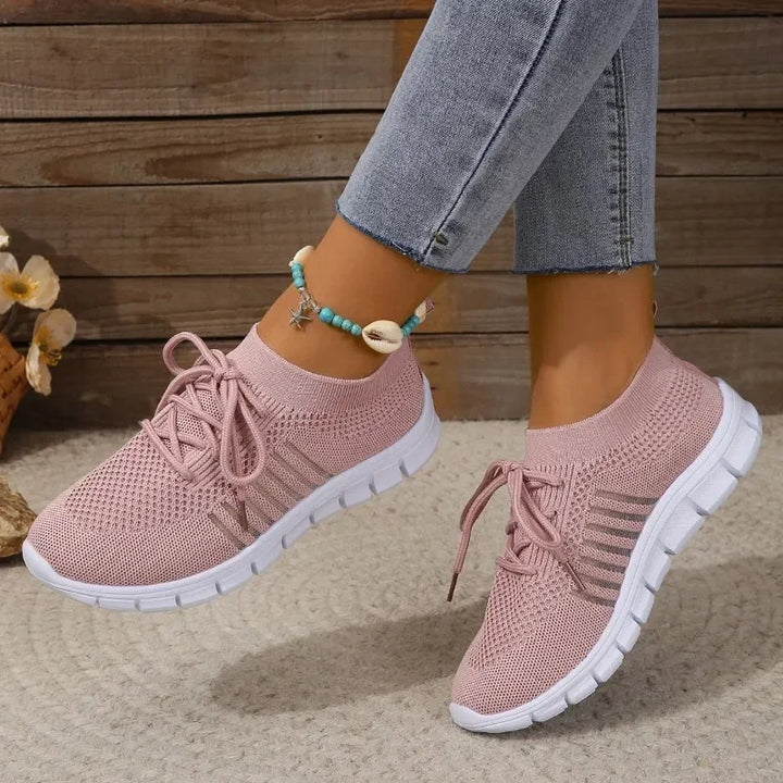 Kvinnors lätta mesh sneakers för sommar, andningsbart material, modern design, perfekt för soliga dagar och fritid.