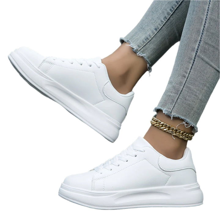 "Kvinnors ortopediska sneakers i modern design, ljusa färger och stötdämpande sula för komfort och stil."