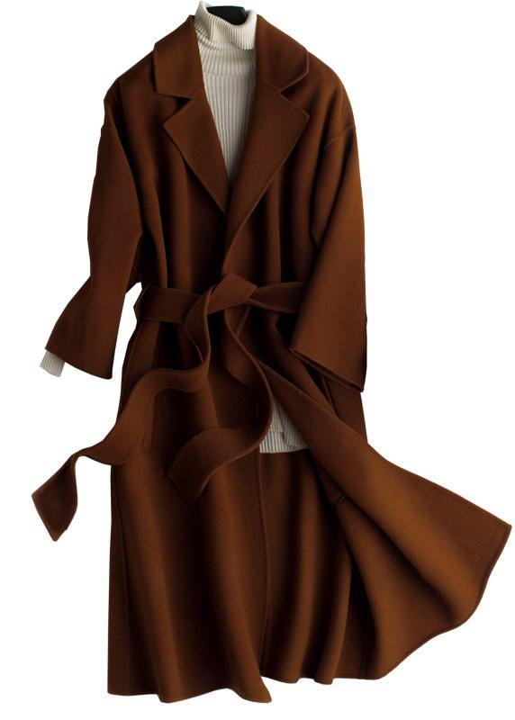 "Kvinnors oversize brun trenchcoat i ullblandning med midjeband; modern stil, elegant och bekväm look."