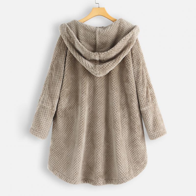 "Kvinnors oversized huvjacka i mjukt, texturerat tyg, perfekt för mysiga, stilmedvetna lager-på-lager outfits."