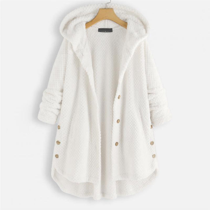 "Kvinnors oversized huvjacka i mjukt, texturerat tyg, perfekt för mysiga, stilmedvetna lager-på-lager outfits."