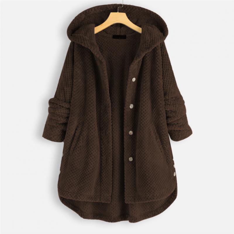 "Kvinnors oversized huvjacka i mjukt, texturerat tyg, perfekt för mysiga, stilmedvetna lager-på-lager outfits."
