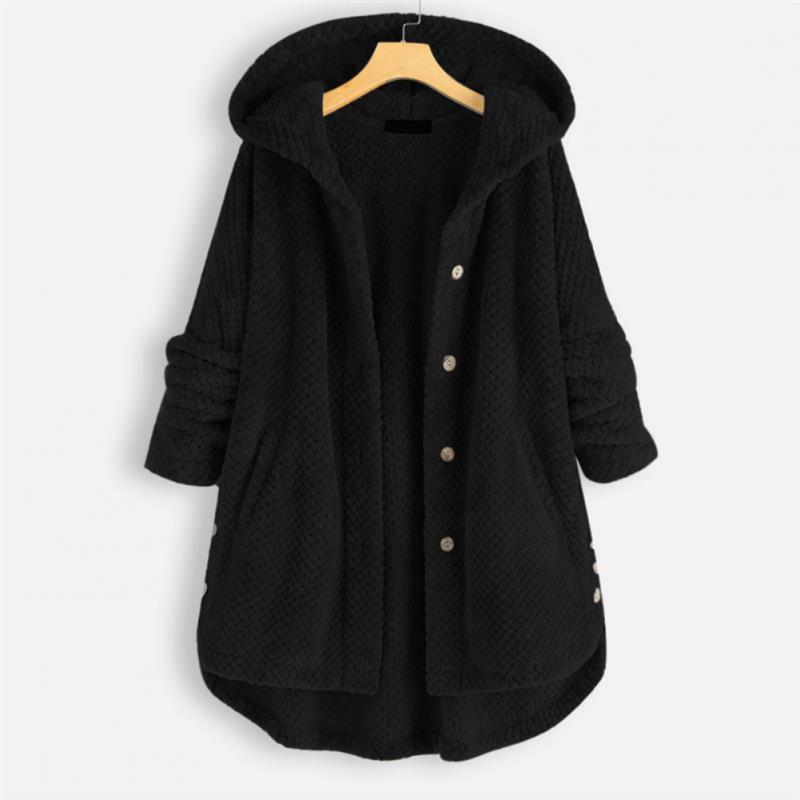 "Kvinnors oversized huvjacka i mjukt, texturerat tyg, perfekt för mysiga, stilmedvetna lager-på-lager outfits."