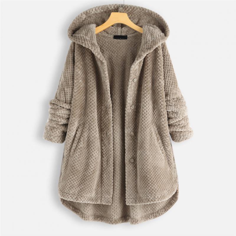 "Kvinnors oversized huvjacka i mjukt, texturerat tyg, perfekt för mysiga, stilmedvetna lager-på-lager outfits."