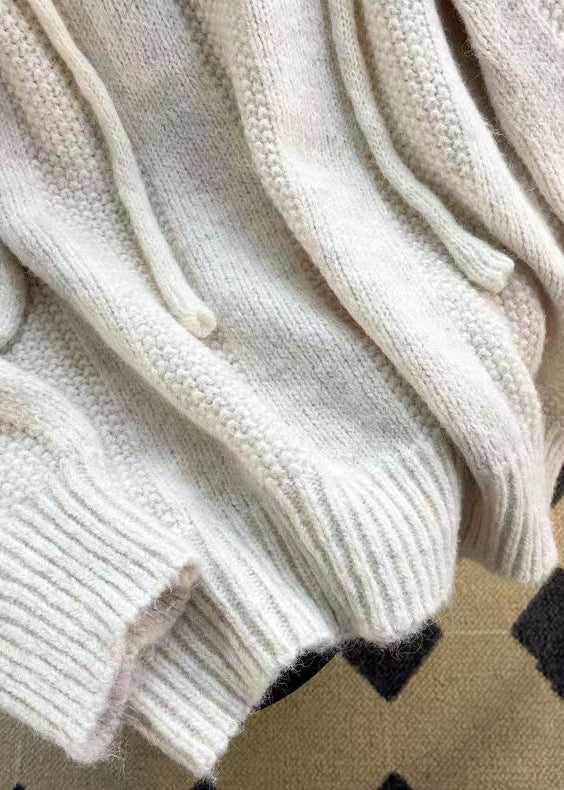 "Kvinnors patchwork hoodie med huva, avslappnad passform och fickor, stilfull design i grönt och brunt."