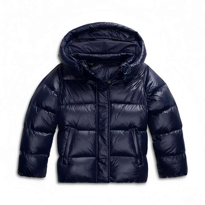 Kvinnors quiltad värmeisolerande jacka, elegant design framifrån, ger komfort och stil för kyliga vinterdagar.