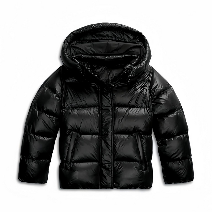 Kvinnors quiltad värmeisolerande jacka, elegant design framifrån, ger komfort och stil för kyliga vinterdagar.