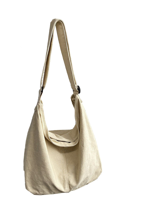 Kvinnors retro handväska i vit canvas med stor kapacitet. Vintage design, rymlig med elegant och tidlös look.