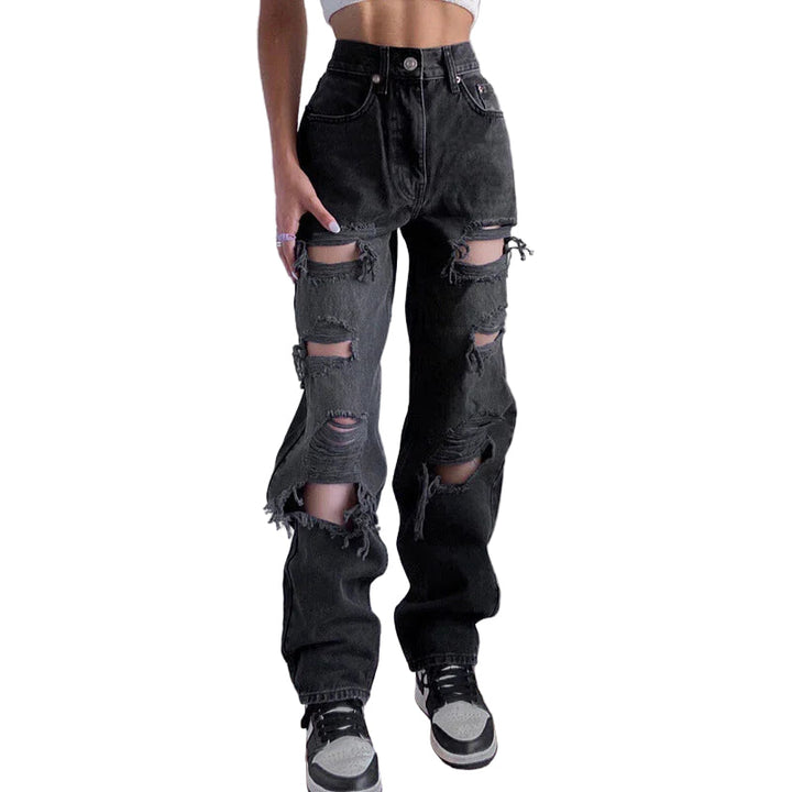 "Kvinnors rippade jeans med rå fåll, avslappnad passform, moderna och edgy, perfekt för unik stil och komfort."