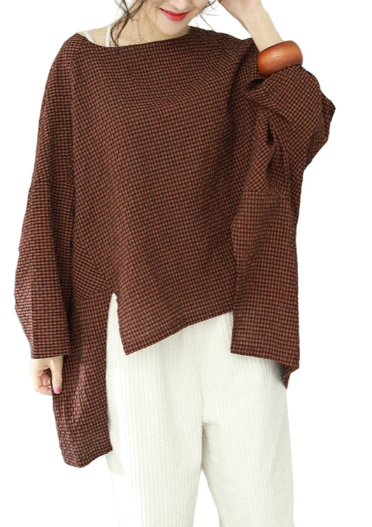 "Kvinnors rutig asymmetrisk topp, avslappnad passform, modern silhuett, perfekt för chic och bekväm stil."