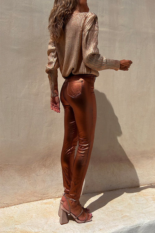 "Kvinnors skinny metallic leggings med trendig finish, figurnära passform, glänsande yta för modemedveten stil"