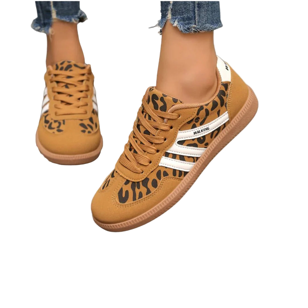 "Kvinnors sneakers med låg profil, elegant design med mjuka mockapaneler, perfekta för både stil och komfort."