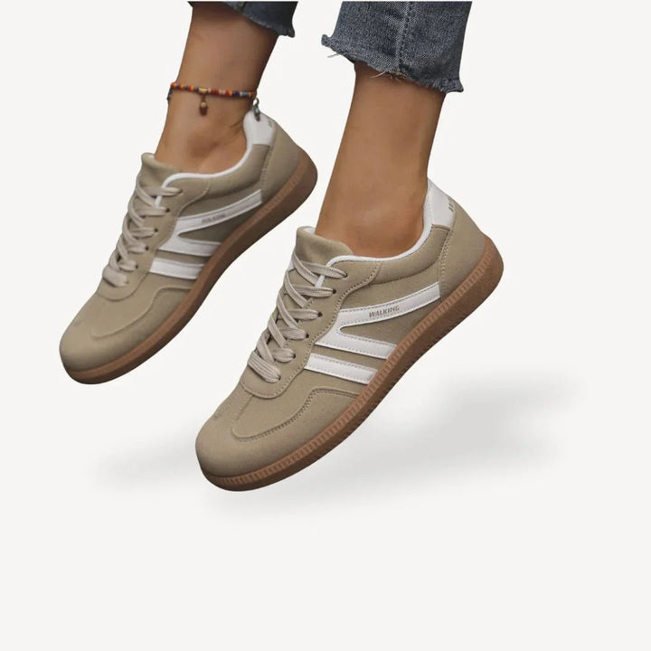 "Kvinnors sneakers med låg profil, elegant design med mjuka mockapaneler, perfekta för både stil och komfort."