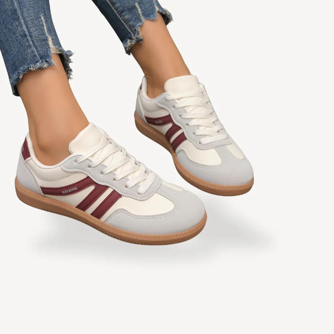 "Kvinnors sneakers med låg profil, elegant design med mjuka mockapaneler, perfekta för både stil och komfort."