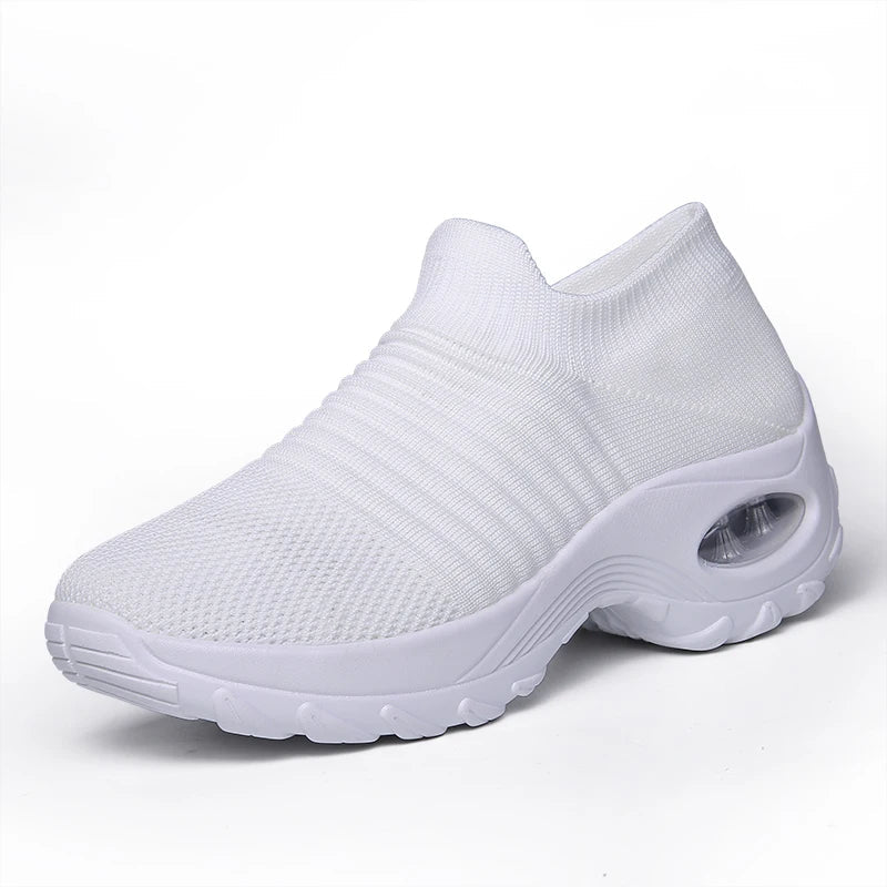 Kvinnors sneakers med tjock sula och luftkudde i flera färger, modern design för stil och komfort.