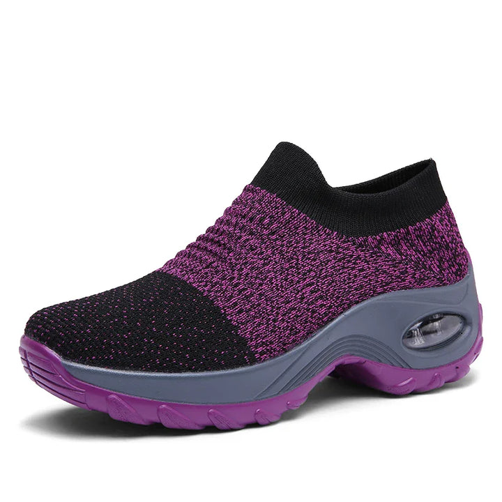 Kvinnors sneakers med tjock sula och luftkudde i flera färger, modern design för stil och komfort.