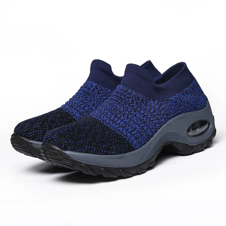 Kvinnors sneakers med tjock sula och luftkudde i flera färger, modern design för stil och komfort.