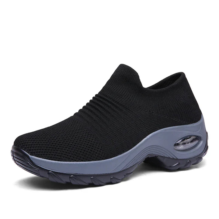 Kvinnors sneakers med tjock sula och luftkudde i flera färger, modern design för stil och komfort.