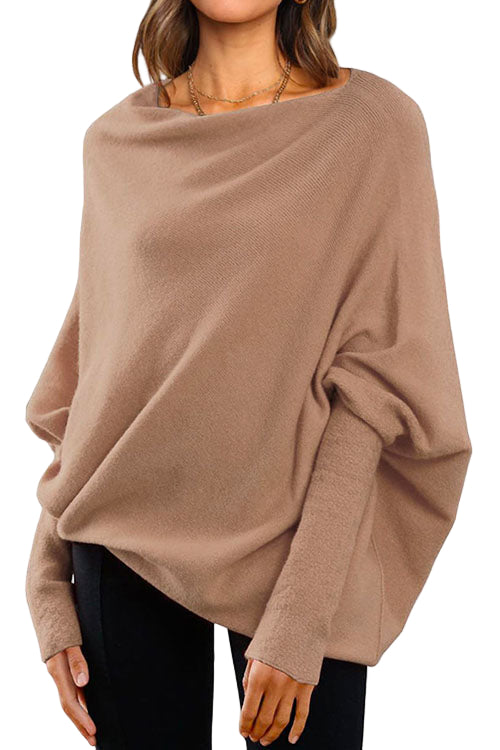 "Kvinnors stickad tröja med fladdermusärm i mjuk bomullsblend för elegant och modern look, ideal för alla tillfällen."
