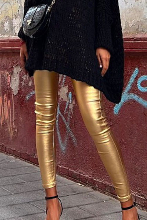 "Kvinnors svarta slim fit konstläder leggings, elegant design, perfekt för både vardag och fest."