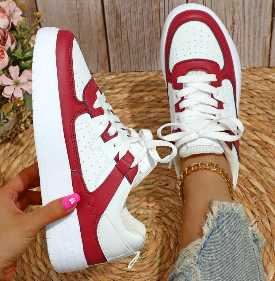 Kvinnors trendiga sneakers med leopardmönster, unik design, komfortabel passform, perfekt för stilmedvetna kvinnor.