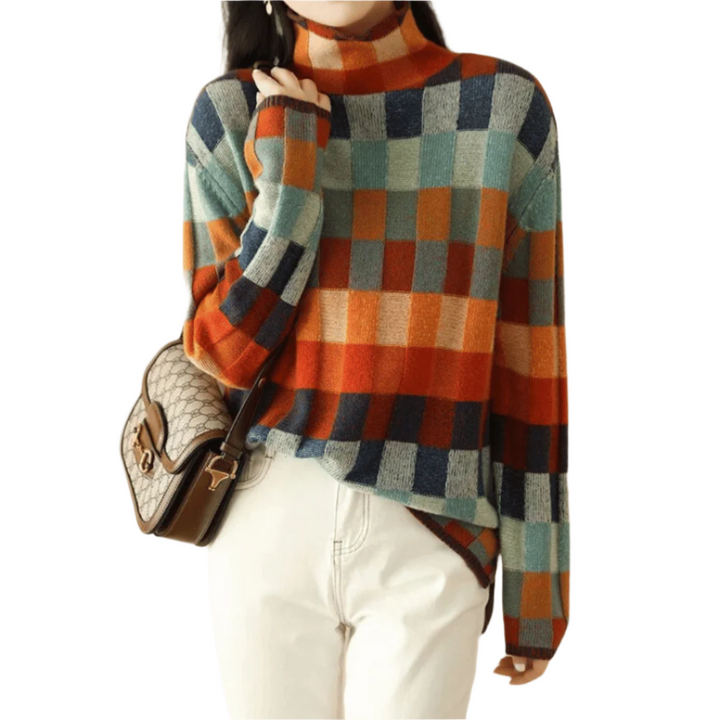 "Kvinnors turtleneck tröja i patchworkdesign, hög krage, mjukt material, perfekt för höstmode och stil."