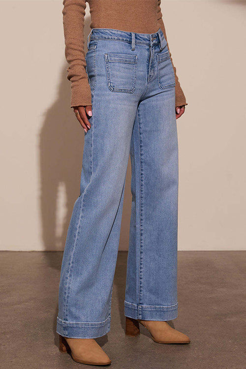 "Kvinnors vida ben jeans, medium mörkblå casual passform, frontvy för avslappnad stil och elegant rörelse."