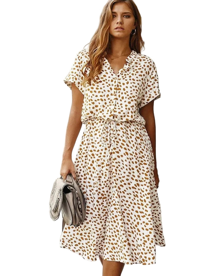 "Kvinnors vintage leopardmönstrad klänning med medelärmar, elegant stil, lätt material, perfekt för alla tillfällen."