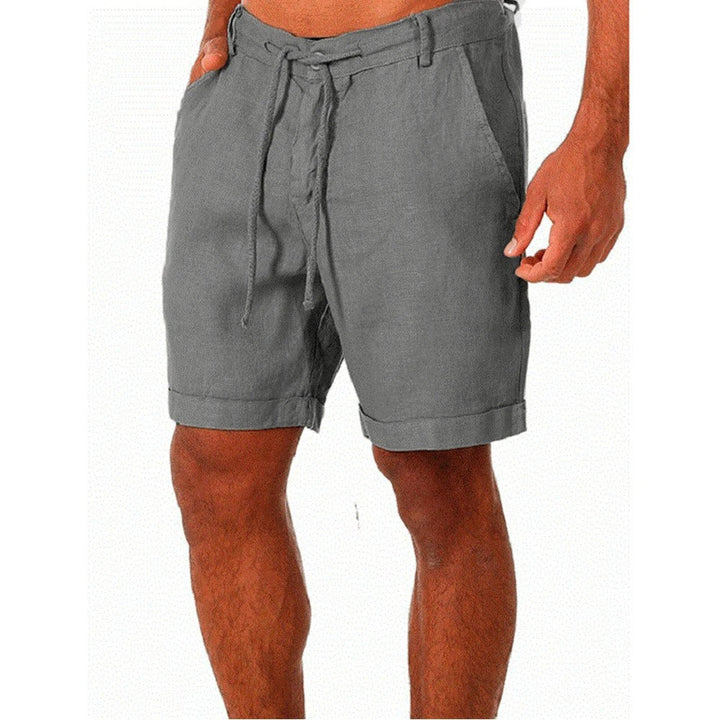 "Linneshorts för män, andningsbart tyg, elastisk midja, elegant snitt, perfekta för sommar och strandaktiviteter."