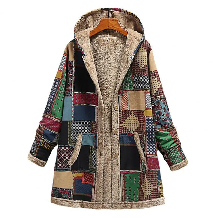 "Lång vintagejacka i tjock fleece med huva och fickor för kvinnor, elegant mönster, perfekt för stil och värme."