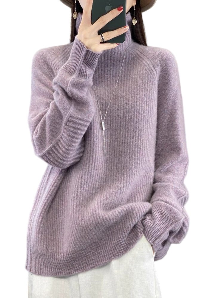 "Lös damtröja i turtleneck, stickad bomull, stilren och bekväm, perfekt för kyliga dagar och lager-på-lager styling."