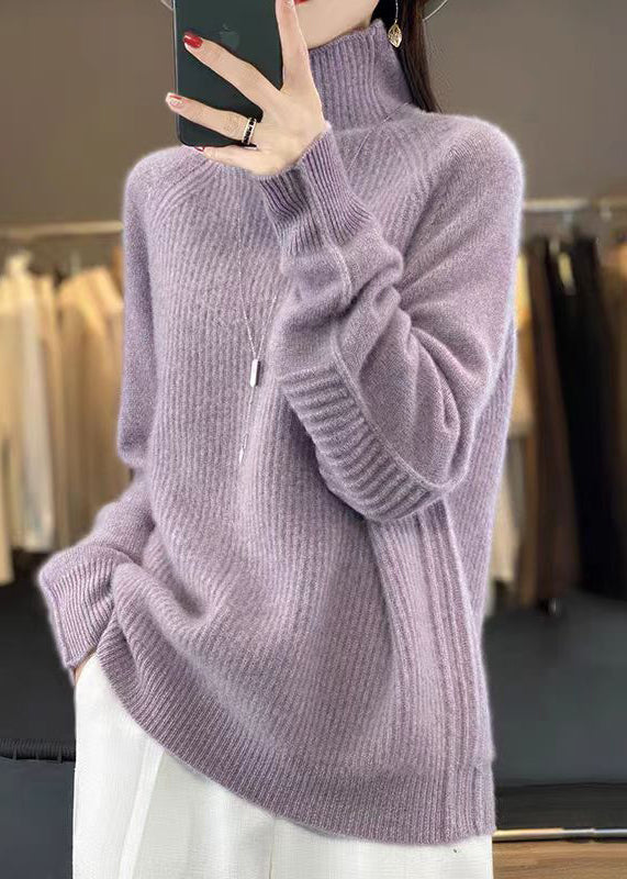 "Lös damtröja i turtleneck, stickad bomull, stilren och bekväm, perfekt för kyliga dagar och lager-på-lager styling."