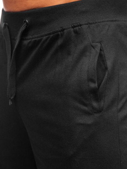 Lösa herrshorts i andningsbart tyg med dragsko och elastiskt midjeband, perfekt för sommar och fritidsaktiviteter.