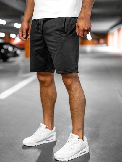 Lösa herrshorts i andningsbart tyg med dragsko och elastiskt midjeband, perfekt för sommar och fritidsaktiviteter.