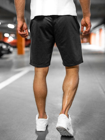 Lösa herrshorts i andningsbart tyg med dragsko och elastiskt midjeband, perfekt för sommar och fritidsaktiviteter.
