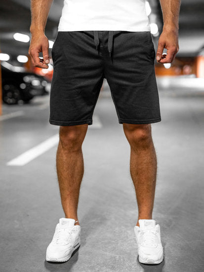 Lösa herrshorts i andningsbart tyg med dragsko och elastiskt midjeband, perfekt för sommar och fritidsaktiviteter.
